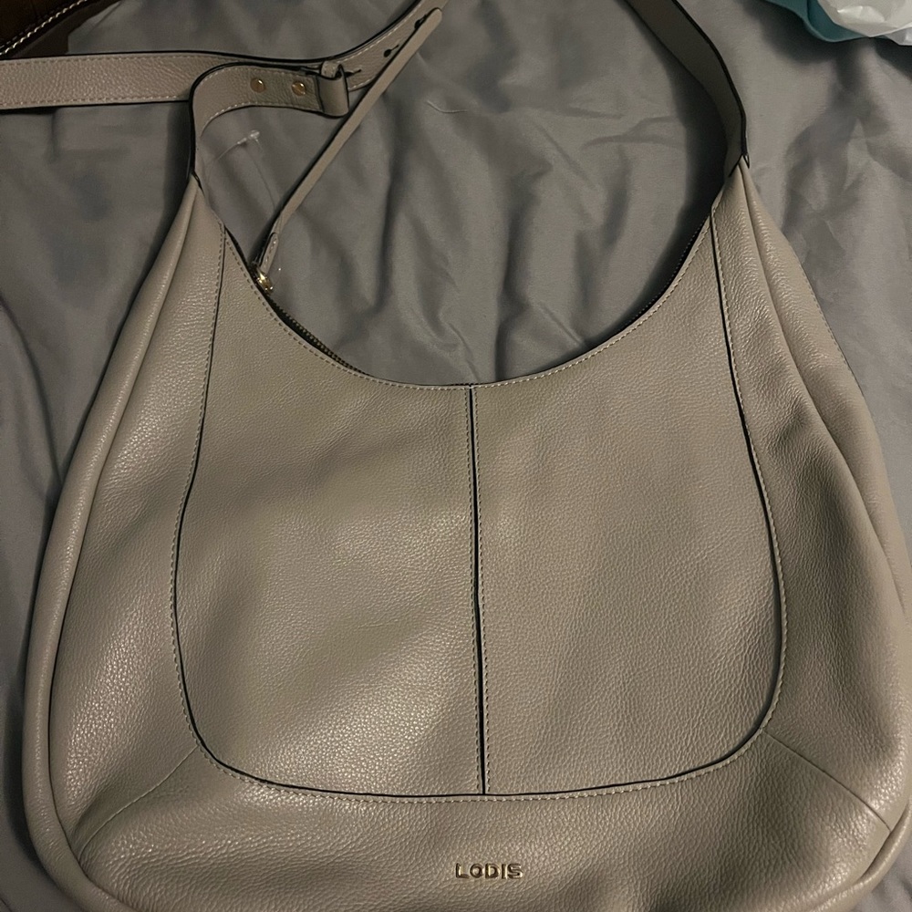 Lodis hobo handbag nwt tan in color